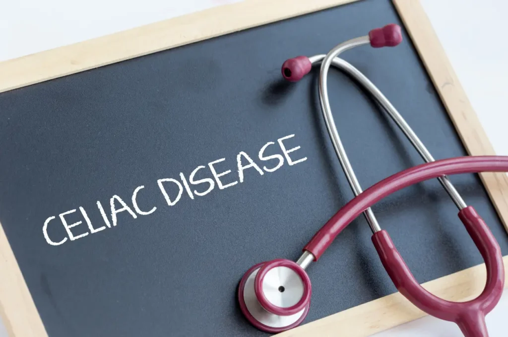Chalkboard displaying the words "Celiac Disease" with a stethoscope, representing medical factors that may contribute to persistent bedwetting in a small number of children.